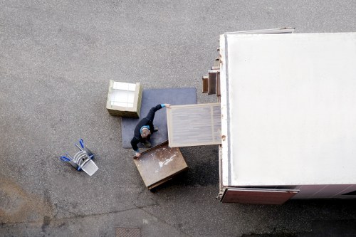 Residents arranging furniture for council pickup in Waltham Forest